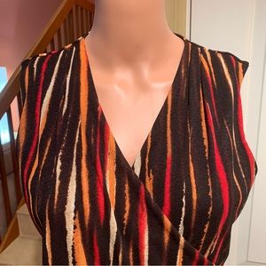 JONES NY‎ COLLECTION. Beautiful striped top with bold colors. Ruched on s…